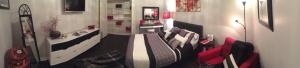 a living room with a couch and a table at Premier National Harbor House in Fort Washington