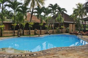 Der Swimmingpool an oder in der Nähe von Saren Indah Hotel - CHSE Certified