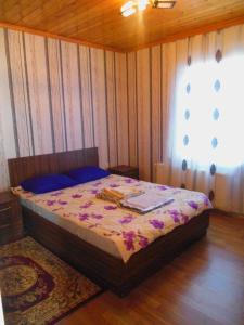 Tempat tidur dalam kamar di Gabala Homes Musa