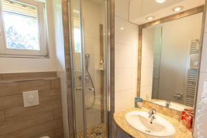 Ванная комната в Bio- und Gesundheitshotel Gutshaus Stellshagen +52 фотографии