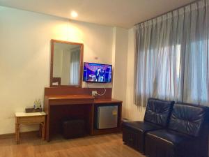 TV/Unterhaltungsangebot in der Unterkunft Srivichai Hotel