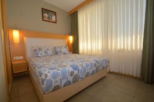 Cama o camas de una habitación en Istankoy Butik Pansiyon