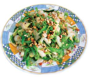 a plate of salad with broccoli and other vegetables at Dai Thanh 1 Motel Cang Sa Ky in Quảng Ngãi +93 photos