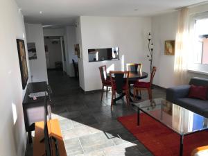 Posezení v ubytování Apartment D'Uval + 11 fotografií