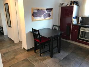 Kuchyň nebo kuchyňský kout v ubytování Apartment D'Uval