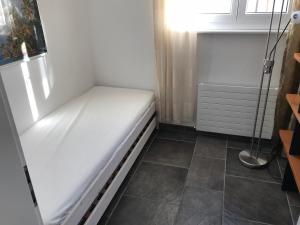 Postel nebo postele na pokoji v ubytování Apartment D'Uval
