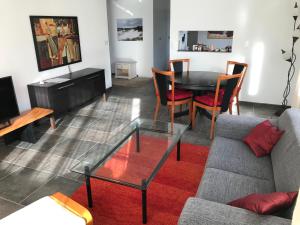 Posezení v ubytování Apartment D'Uval