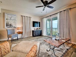 a living room with a couch and a table at Beachside Hideout Unit K in Clearwater Beach