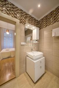 Ванная комната в Luxurious Apartments Ujezd
