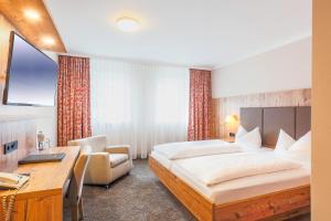 Postel nebo postele na pokoji v ubytování Hotel - Restaurant Erich Rödiger