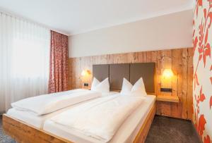 Postel nebo postele na pokoji v ubytování Hotel - Restaurant Erich Rödiger
