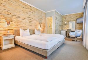 Postel nebo postele na pokoji v ubytování Hotel - Restaurant Erich Rödiger