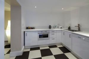 Una cocina o zona de cocina en B&B Belgravia