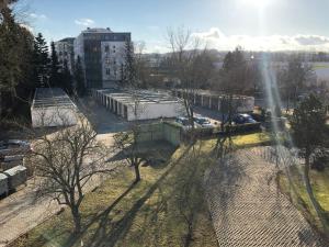 an overhead view of a city with trees and buildings at Appartement Redhouse in Regensburg