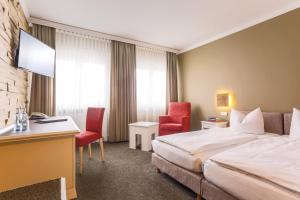 Postel nebo postele na pokoji v ubytování Hotel - Restaurant Erich Rödiger