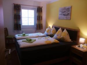 Llit o llits en una habitació de Appartment Stroblhof
