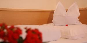 Posteľ alebo postele v izbe v ubytovaní Hotel la Plaza