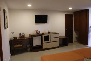 Kuchyň nebo kuchyňský kout v ubytování Hotel Bachue