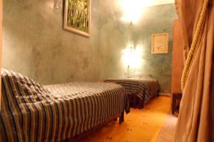 Cama o camas de una habitación en Riad Lapis-lazuli