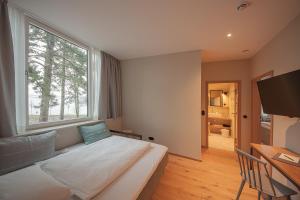 Postel nebo postele na pokoji v ubytování Hotel Strandleben