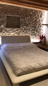 Postel nebo postele na pokoji v ubytování B&B Agli Angeli