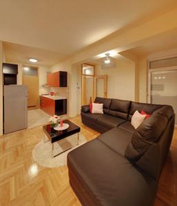 Kuchyň nebo kuchyňský kout v ubytování Apartments Postic