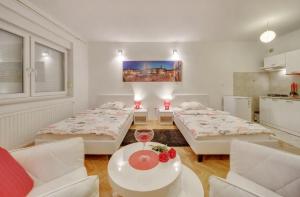 Postel nebo postele na pokoji v ubytování Apartments Postic