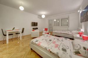 Postel nebo postele na pokoji v ubytování Apartments Postic