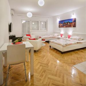 Postel nebo postele na pokoji v ubytování Apartments Postic