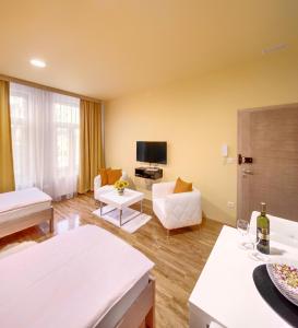 TV a/nebo společenská místnost v ubytování Apartments Postic