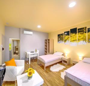 Postel nebo postele na pokoji v ubytování Apartments Postic