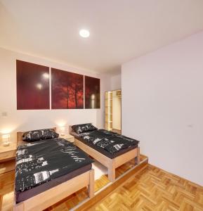 Postel nebo postele na pokoji v ubytování Apartments Postic