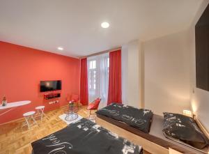 TV a/nebo společenská místnost v ubytování Apartments Postic