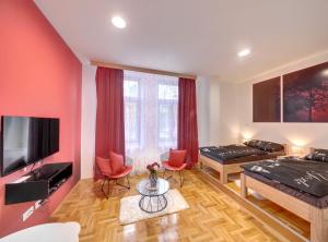 TV a/nebo společenská místnost v ubytování Apartments Postic