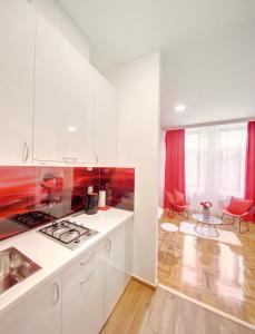 Kuchyň nebo kuchyňský kout v ubytování Apartments Postic