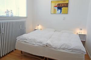 Postel nebo postele na pokoji v ubytování Skagen Room