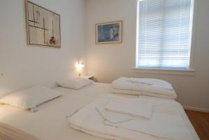 Postel nebo postele na pokoji v ubytování Skagen Room