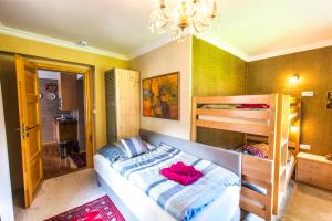 Кровать или кровати в номере Moroder Haus