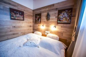 Кровать или кровати в номере Moroder Haus