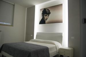 A bed or beds in a room at Maison Audrey