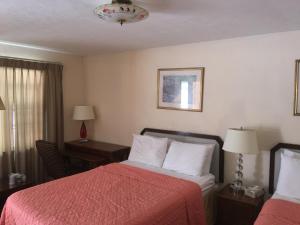 Voodi või voodid majutusasutuse Anchor Motel toas