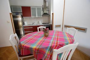 Kuchyň nebo kuchyňský kout v ubytování Apartment Toma