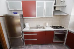 Kuchyň nebo kuchyňský kout v ubytování Apartment Toma
