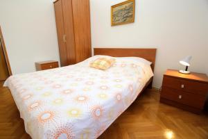 Postel nebo postele na pokoji v ubytování Apartment Toma