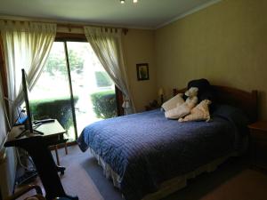 Postel nebo postele na pokoji v ubytování Parcela privada con piscina en Olmué