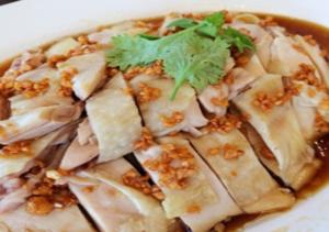 a dish of food with ailantroilantro leaf on top at Hadthong Resort in Pak Phayun