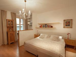 Postel nebo postele na pokoji v ubytování Boutique Hotel Albero Nascosto