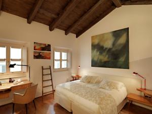 Postel nebo postele na pokoji v ubytování Boutique Hotel Albero Nascosto