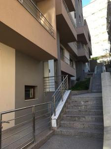 a set of stairs leading up to a building at Apartment Park Sveti Vrach in Sandanski