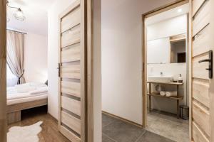 Posteľ alebo postele v izbe v ubytovaní Apartament Piaseckiego Centrum